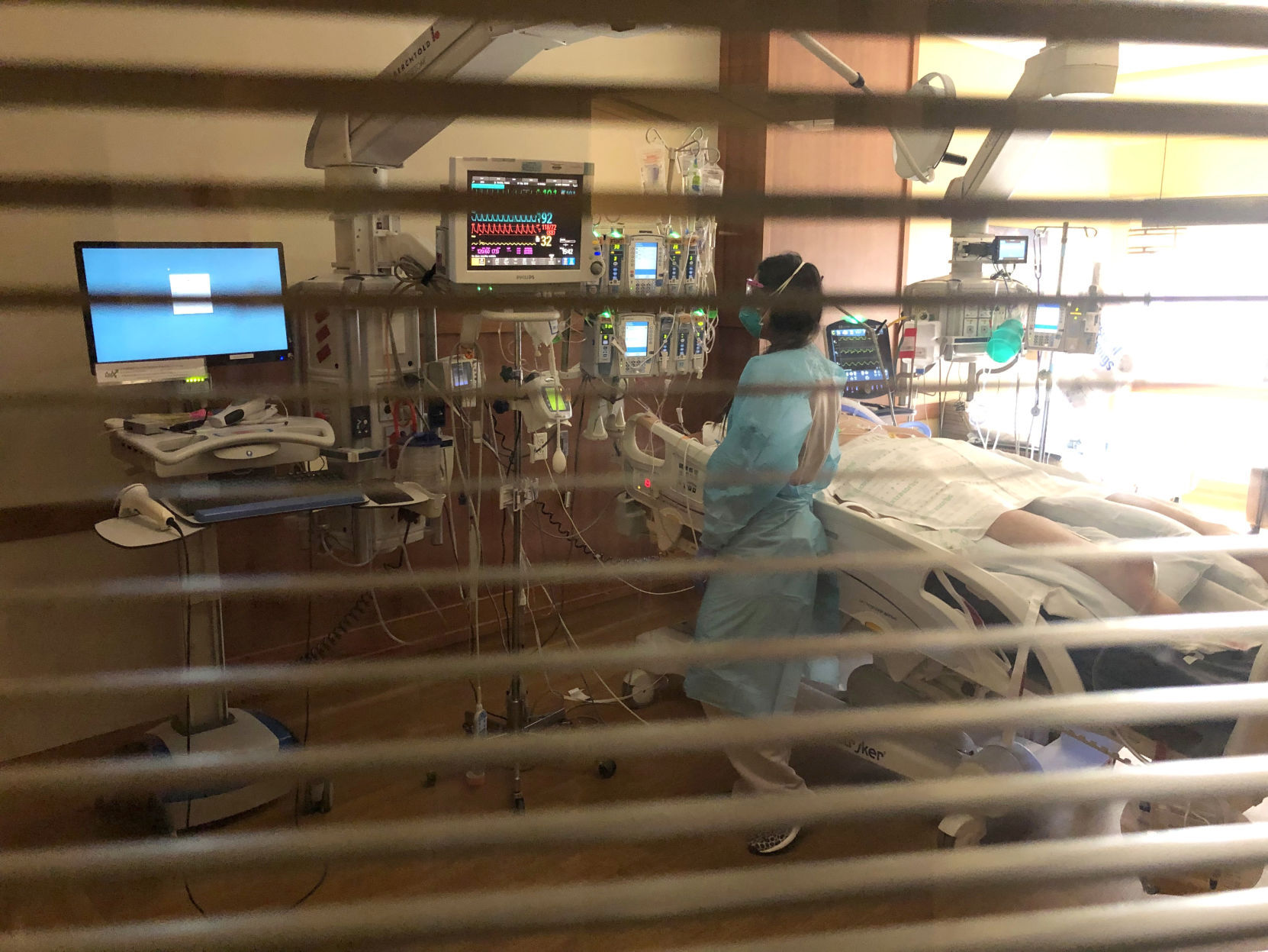 A nurse cares for a patient